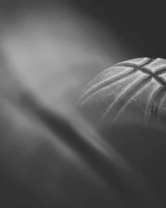 Close-up detail of a basketball showing texture and seams.